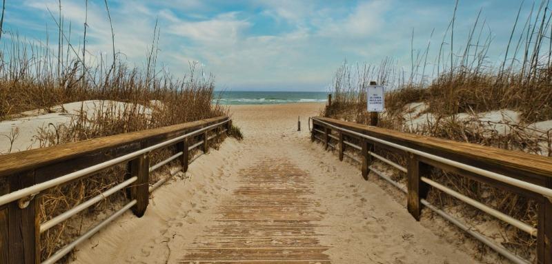 Boardwalk leading to the sand and oceanfront view near Carolina Beach oceanfront rentals